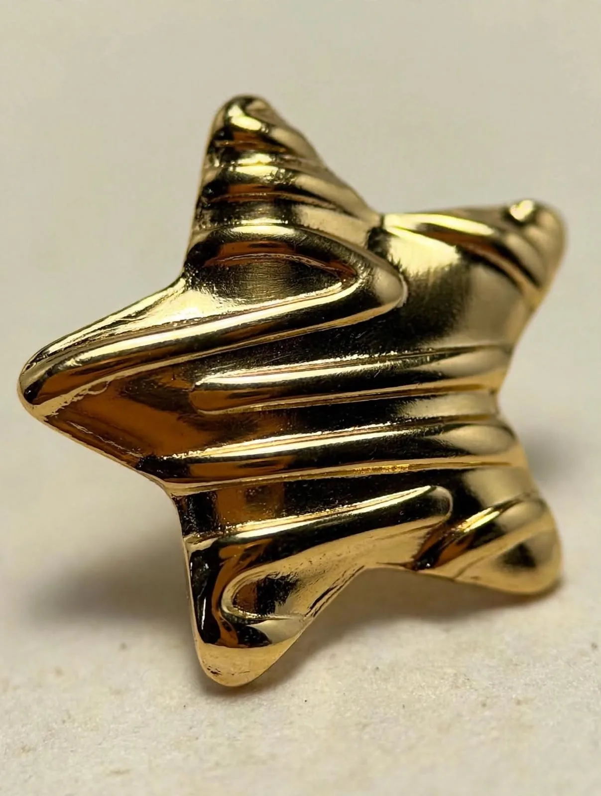Arete Estrella Drapeada